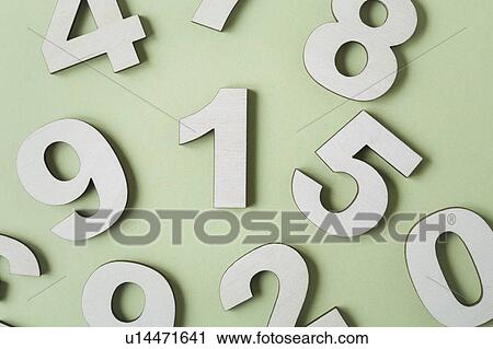 Stock Image - Numbers on white background, studio shot. Fotosearch