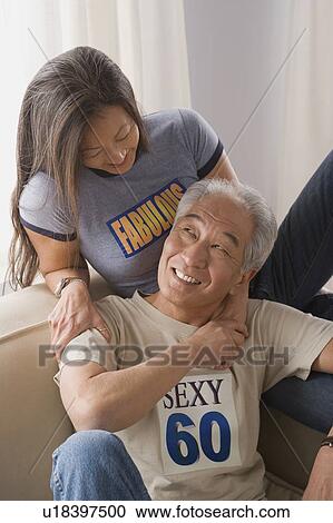 Older couple holding hands and laughing View Large Photo Image Stock Image - Older couple holding hands and laughing. Fotosearch