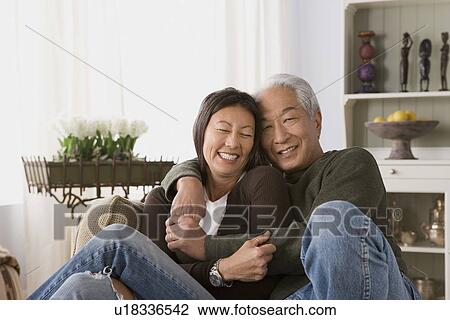 Older couple in warm embrace View Large Photo Image Stock Image - Older couple in warm embrace. Fotosearch