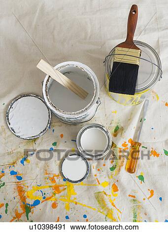 Paint cans and paintbrushes on drop cloth View Large Photo Image Stock Image - Paint cans and paintbrushes on drop cloth. Fotosearch