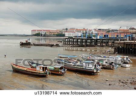 Panama, Panama City, Fishing boats on coastline at low tide View Large Photo Image Picture - Panama, Panama City, Fishing boats on coastline at low tide. Fotosearch