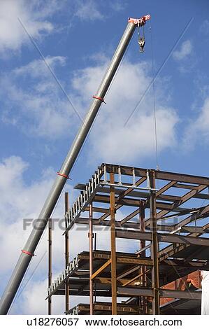 Part of construction frame and crane View Large Photo Image Stock Photo - Part of construction frame and crane. Fotosearch