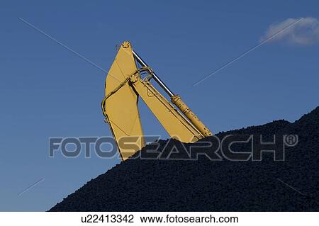 Part of crane behind coal stack View Large Photo Image Stock Image - Part of crane behind coal stack. Fotosearch