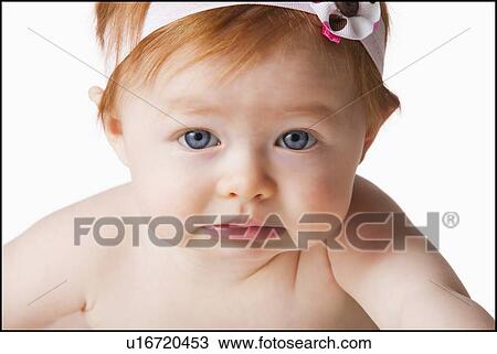 Portrait of baby girl (6-11 months) looking at camera, studio shot View Large Photo Image Stock Image - Portrait of baby girl (6-11 months) looking at camera, studio shot. Fotosearch