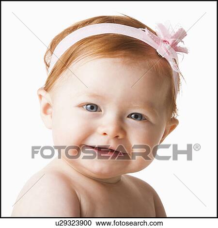 Portrait of baby girl (6-11 months) smiling, studio shot View Large Photo Image Stock Image - Portrait of baby girl (6-11 months) smiling, studio shot. Fotosearch