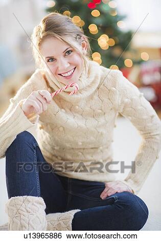 Portrait of beautiful woman wearing wooly sweater View Large Photo Image Stock Photograph - Portrait of beautiful woman wearing wooly sweater. Fotosearch