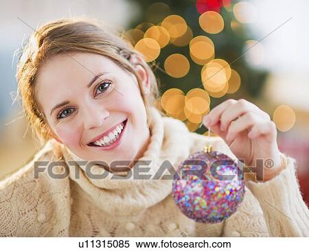 Portrait of beautiful woman wearing wooly sweater View Large Photo Image Stock Photography - Portrait of beautiful woman wearing wooly sweater. Fotosearch