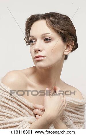 Portrait of beautiful young woman, studio shot View Large Photo Image Stock Image - Portrait of beautiful young woman, studio shot. Fotosearch