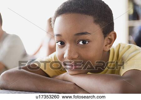 Portrait of boy in classroom View Large Photo Image Stock Image - Portrait of boy in classroom. Fotosearch