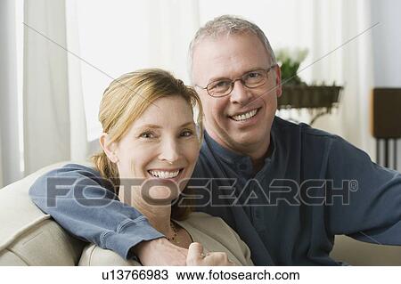 Stock Image - Portrait of couple embracing. Fotosearch