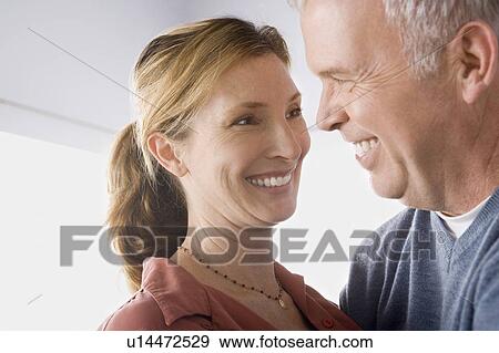 Portrait of couple embracing View Large Photo Image Stock Photo - Portrait of couple embracing. Fotosearch