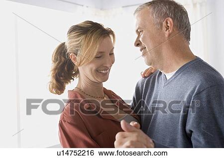 Portrait of couple embracing View Large Photo Image Stock Photograph - Portrait of couple embracing. Fotosearch