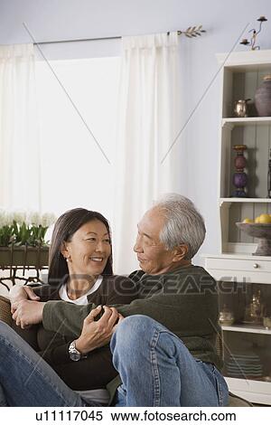 Stock Photography - Portrait of couple embracing. Fotosearch