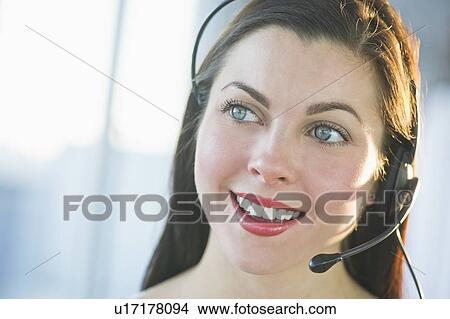 Portrait of female customer service representative View Large Photo Image Picture - Portrait of female customer service representative. Fotosearch