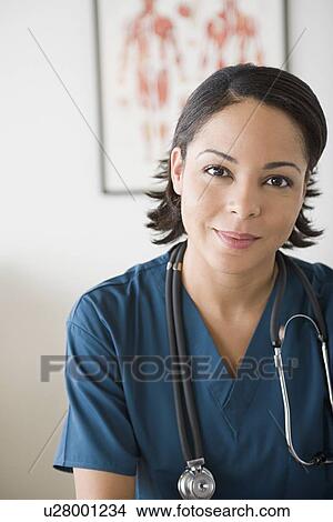 Portrait of female doctor View Large Photo Image Picture - Portrait of female doctor. Fotosearch
