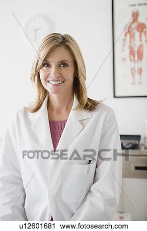 Stock Image - Portrait of female doctor. Fotosearch