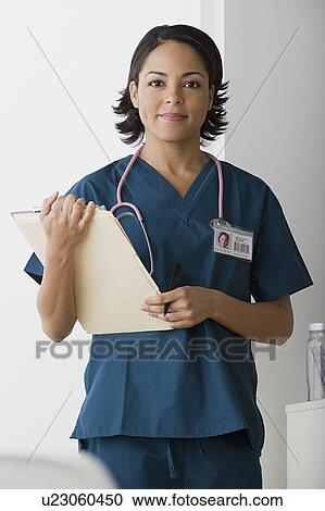 Portrait of female doctor View Large Photo Image Stock Image - Portrait of female doctor. Fotosearch