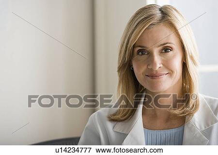 Stock Photo - Portrait of female doctor. Fotosearch