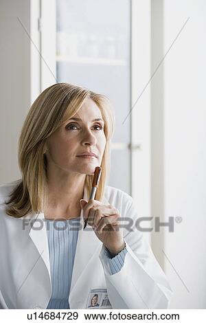 Stock Photo - Portrait of female doctor. Fotosearch