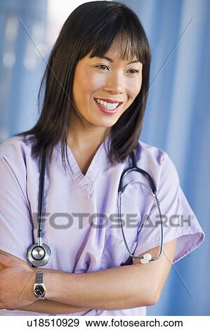 Portrait of female doctor View Large Photo Image Stock Photo - Portrait of female doctor. Fotosearch