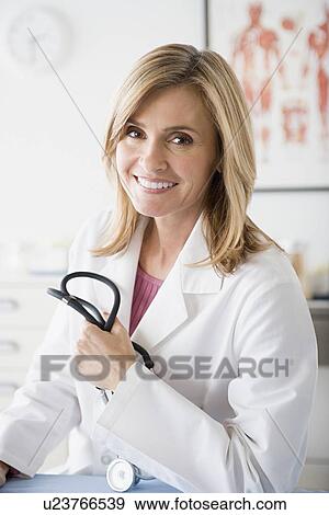 Stock Photo - Portrait of female doctor. Fotosearch