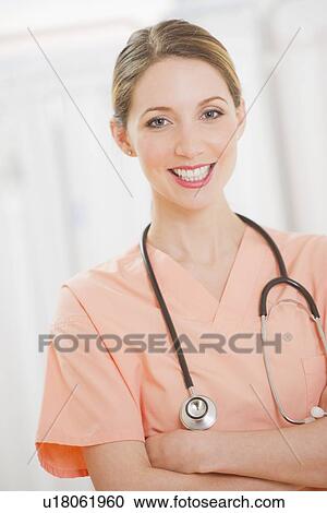 Portrait of female doctor with stethoscope View Large Photo Image Stock Image - Portrait of female doctor with stethoscope. Fotosearch