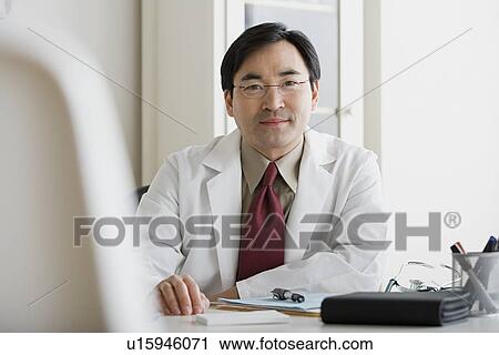 Portrait of male doctor View Large Photo Image Stock Image - Portrait of male doctor. Fotosearch