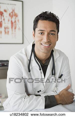 Portrait of male doctor View Large Photo Image Stock Image - Portrait of male doctor. Fotosearch