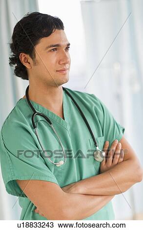 Portrait of male doctor View Large Photo Image Stock Image - Portrait of male doctor. Fotosearch