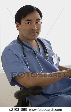 Portrait of male doctor View Large Photo Image Stock Image - Portrait of male doctor. Fotosearch