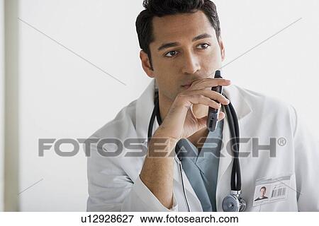 Portrait of male doctor View Large Photo Image Stock Photo - Portrait of male doctor. Fotosearch