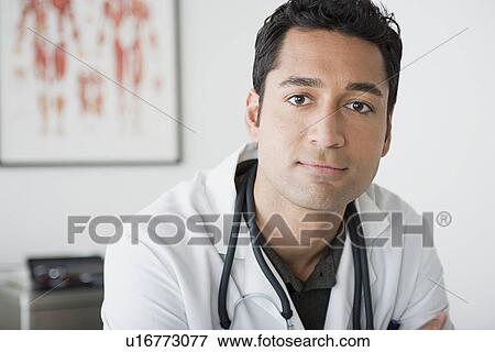 Portrait of male doctor View Large Photo Image Stock Photo - Portrait of male doctor. Fotosearch