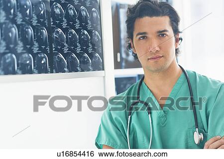 Portrait of male doctor View Large Photo Image Stock Photograph - Portrait of male doctor . Fotosearch