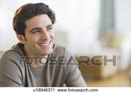 Stock Image - Portrait of man smiling. Fotosearch