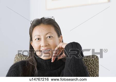 Portrait of mature woman View Large Photo Image Stock Photograph - Portrait of mature woman. Fotosearch