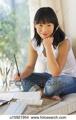 Portrait of mid adult painter at home View Large Photo Image Picture - Portrait of mid adult painter at home. Fotosearch