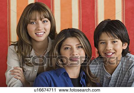 Stock Image - Portrait of mother with two children. Fotosearch