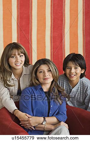 Stock Photo - Portrait of mother with two children. Fotosearch