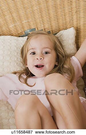 Portrait of playful girl View Large Photo Image Stock Photo - Portrait of playful girl. Fotosearch