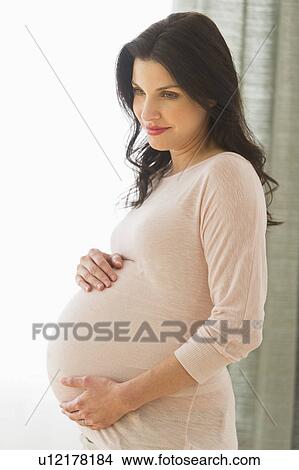 Picture - Portrait of pregnant woman. Fotosearch