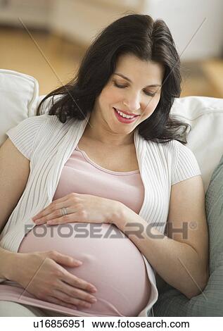 Stock Image - Portrait of pregnant woman. Fotosearch