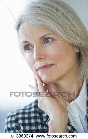 Picture - Portrait of senior businesswoman . Fotosearch