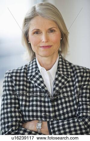 Stock Photo - Portrait of senior businesswoman . Fotosearch