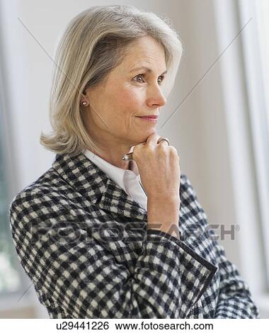 Stock Photograph - Portrait of senior businesswoman . Fotosearch