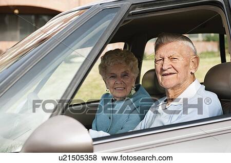 Portrait of senior couple in car View Large Photo Image Stock Photo - Portrait of senior couple in car. Fotosearch