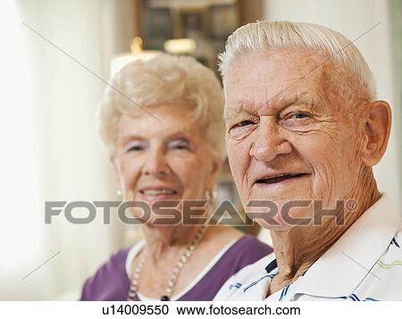 Stock Image - Portrait of senior couple smiling. Fotosearch