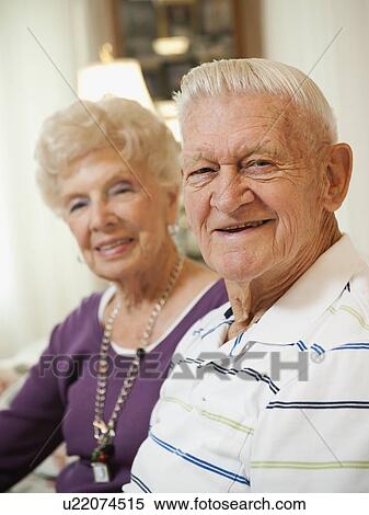 Stock Photography - Portrait of senior couple smiling. Fotosearch