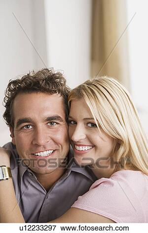 Stock Photo - Portrait of smiling couple. Fotosearch