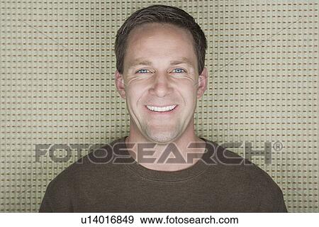 Stock Photo - Portrait of smiling man. Fotosearch