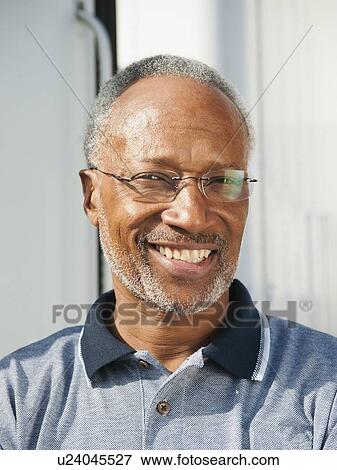 Portrait of smiling man View Large Photo Image Stock Photo - Portrait of smiling man. Fotosearch